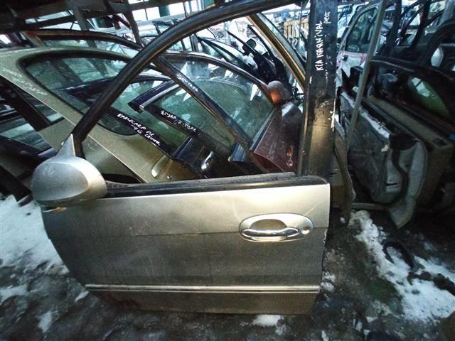 Замок двери передней левой F94A73 Kia Carnival - Фото 1