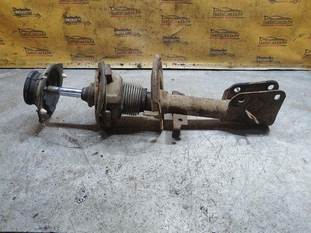 Амортизатор передний левый 0XK3X6 Renault Laguna купить на авторазборке