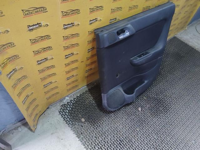 Обшивка двери задней правой (дверная карта) D75GJK Opel Astra купить с доставкой