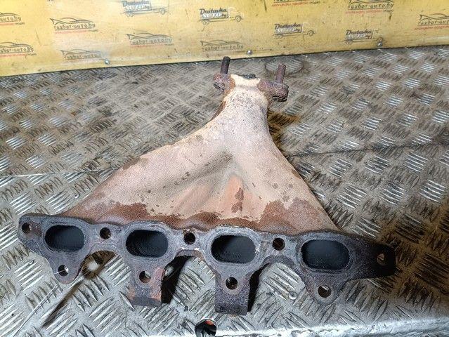 Коллектор выпускной EYY51W Kia Shuma купить в магазине запчастей бу