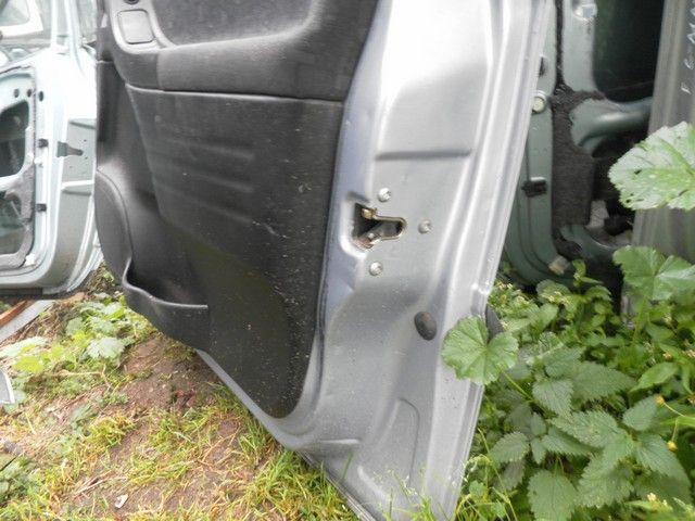 Замок двери передней правой 7SAQY0 Opel Zafira