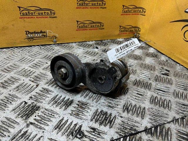 Натяжитель ремня генератора IK5I7A Volkswagen Golf - Фото 1