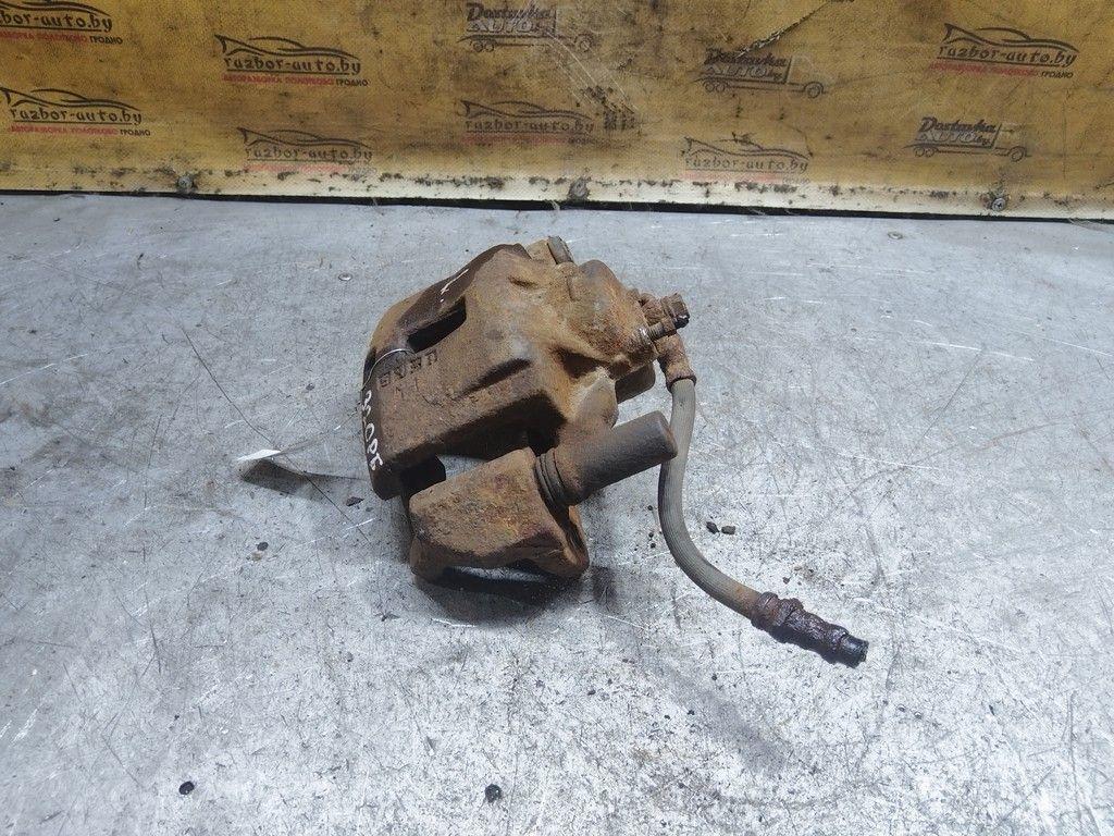 Суппорт передний левый P21G5W Mazda Xedos 6 - Фото 1