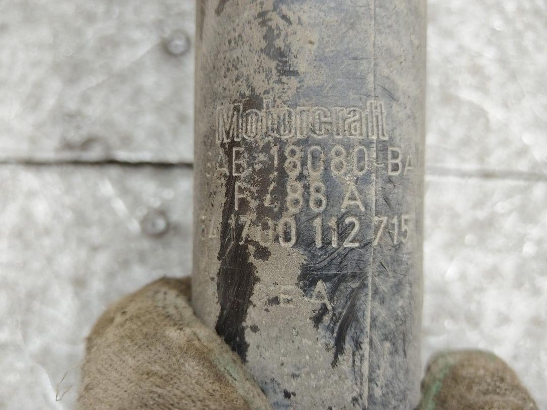 Амортизатор задний левый E4HIL2 Ford Escort купить на авторазборке