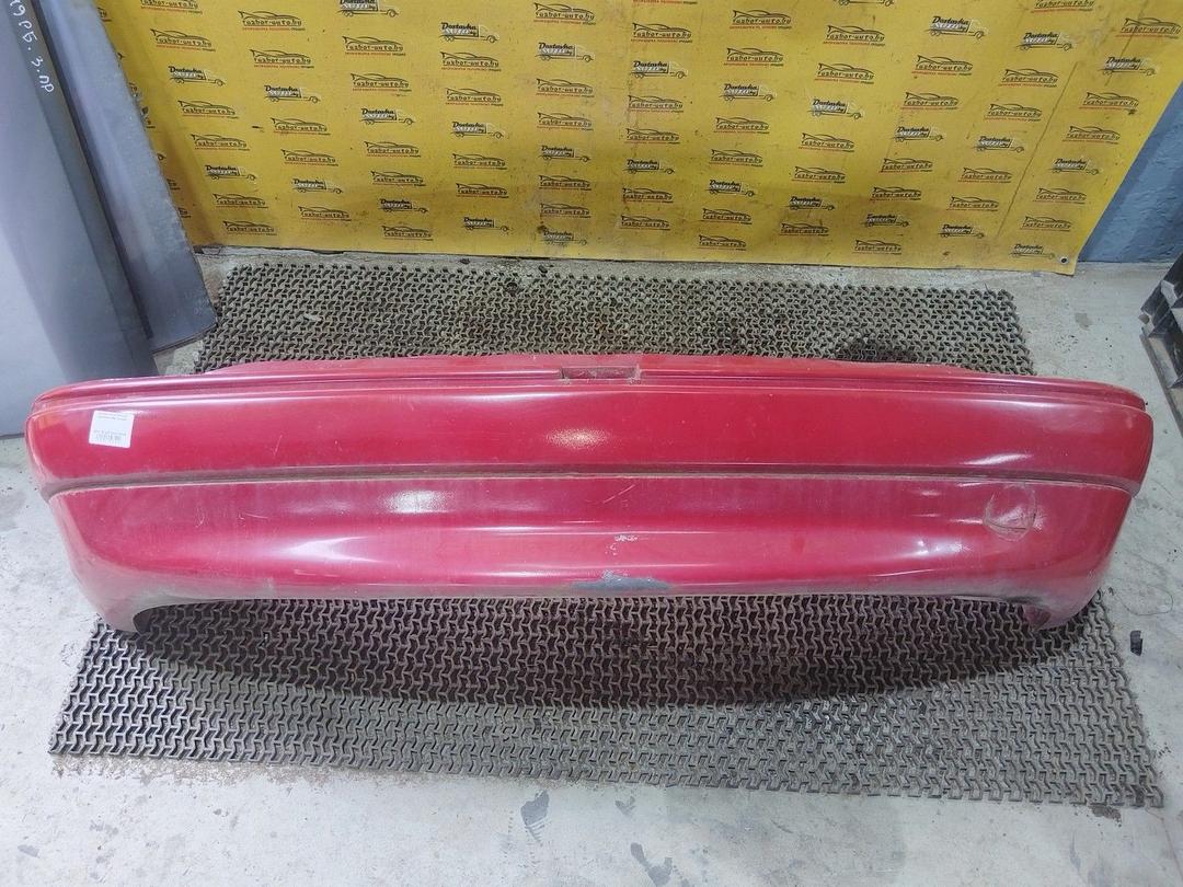 Бампер задний 0PKTGH Opel Astra