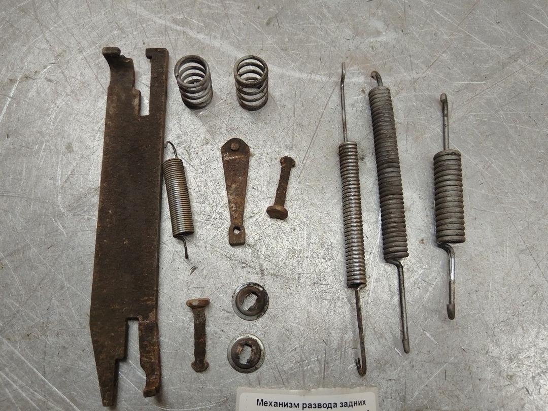 Механизм развода задних тормозных колодок правый NFSU8A Audi 80