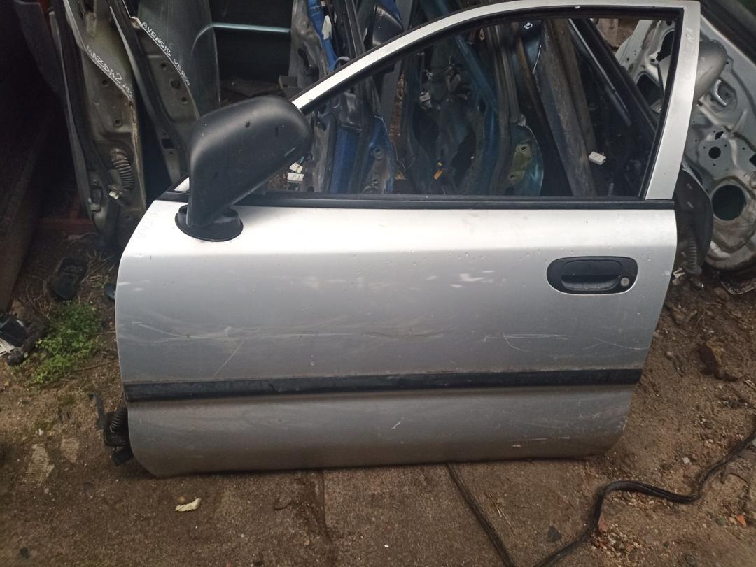 Замок двери передней левой 7N8T02 Mitsubishi Carisma - Фото 1