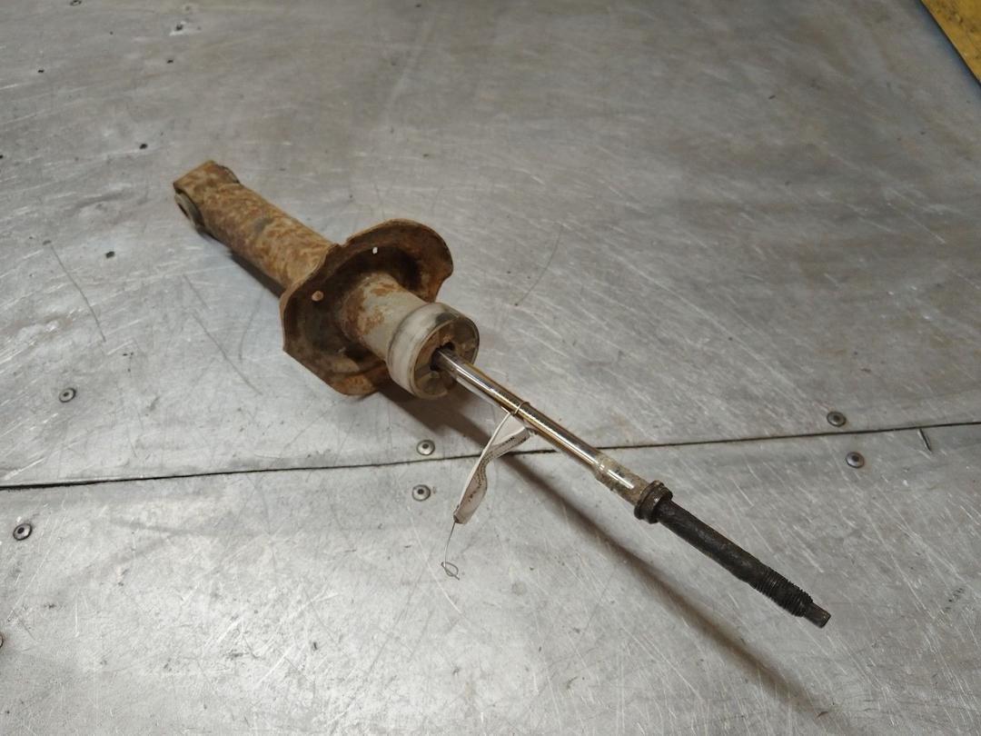 Амортизатор задний левый H6QVCQ Nissan Almera