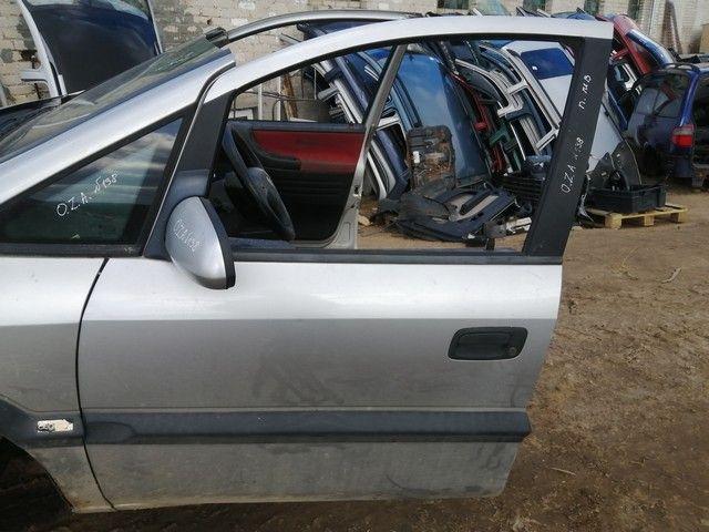 Стекло двери передней левой 1XAAGL Opel Zafira