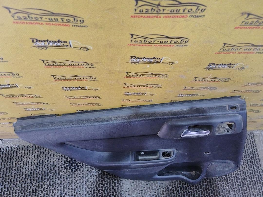 Обшивка двери задней левой (дверная карта) P4FLDL Opel Astra купить с доставкой