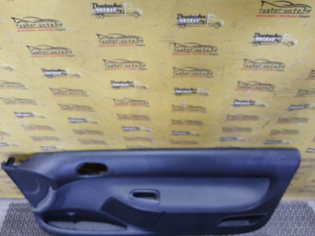 Обшивка двери передней правой (дверная карта) EFA43P Peugeot 206 купить