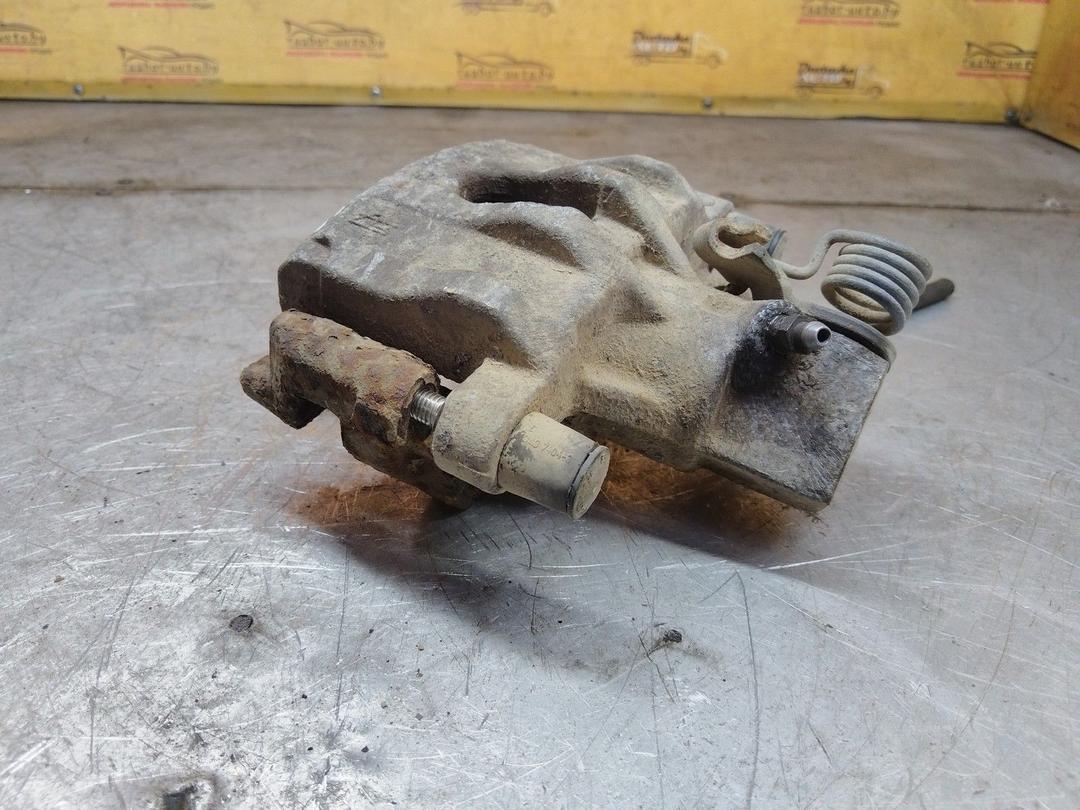 Суппорт задний левый 7F5H6U Ford Focus купить