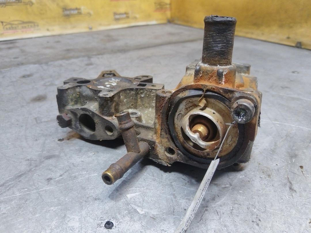 Корпус термостата K0AL9Y Peugeot 806 купить в магазине запчастей бу