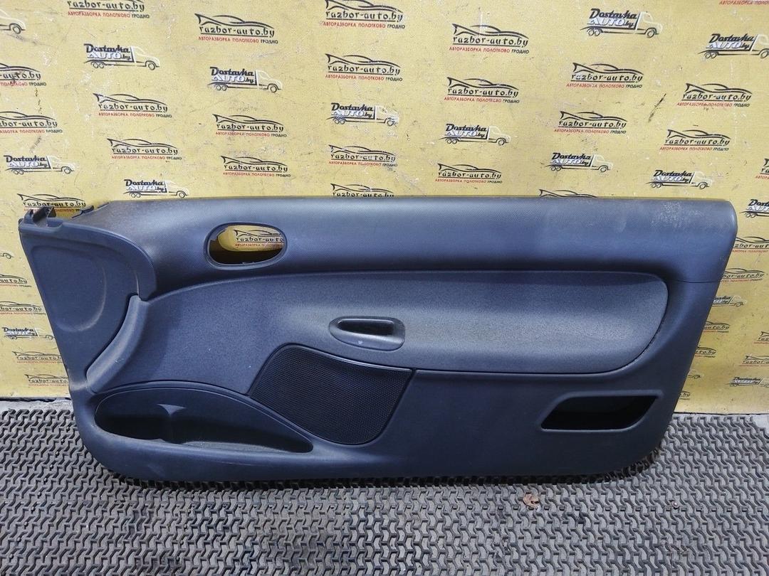 Обшивка двери передней правой (дверная карта) EFA43P Peugeot 206