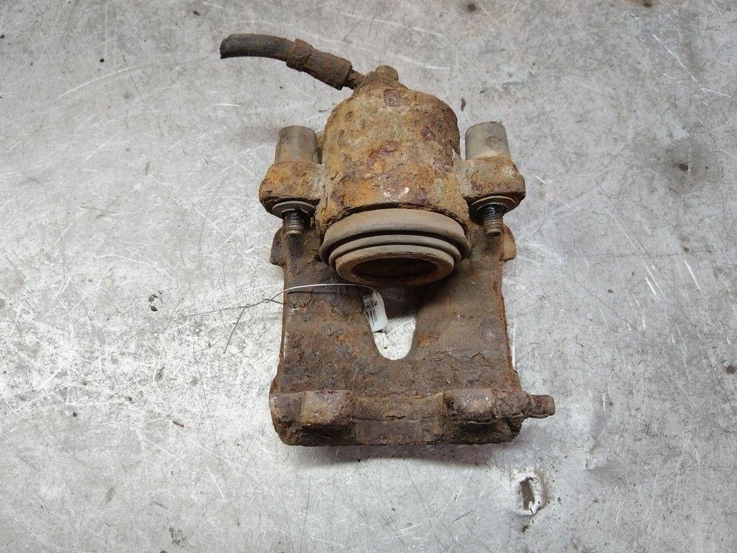 Суппорт передний левый AIY64F Skoda Fabia купить в магазине запчастей бу