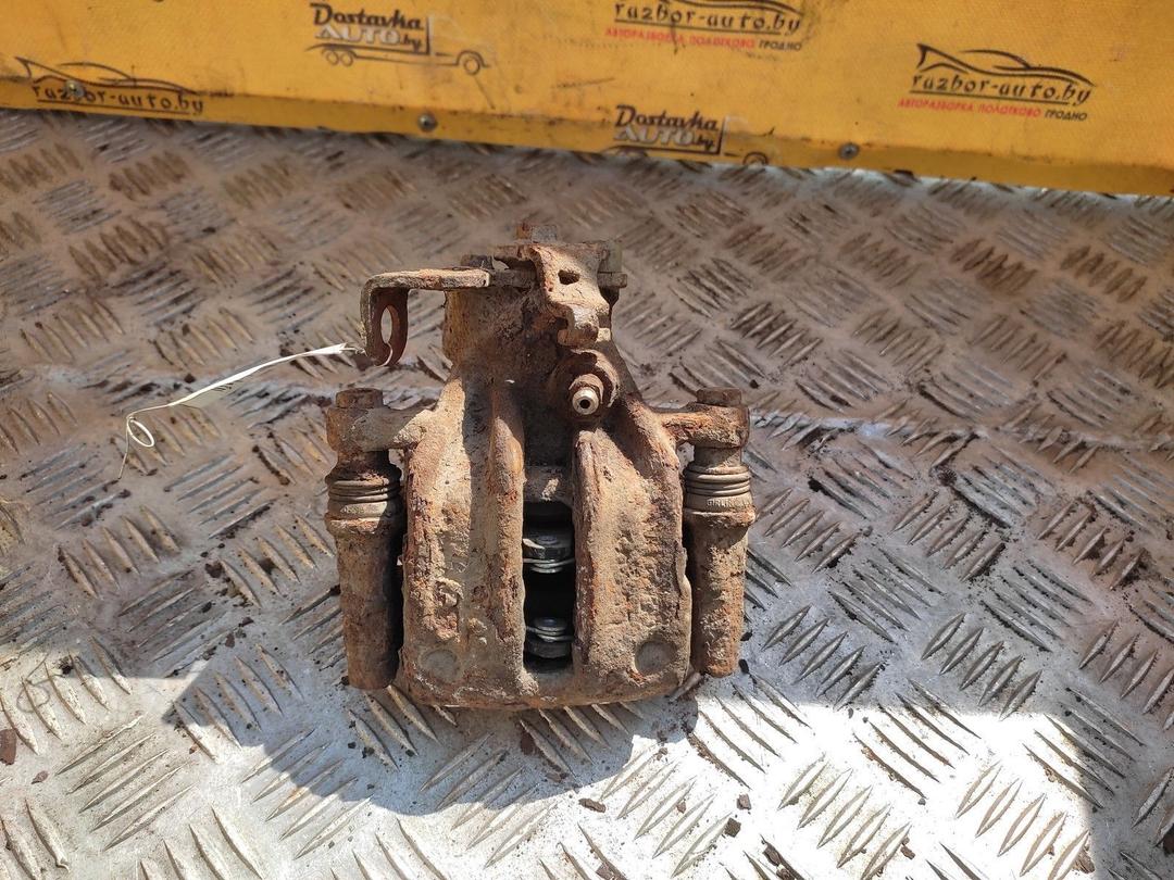 Суппорт задний правый 003E8I Audi 80