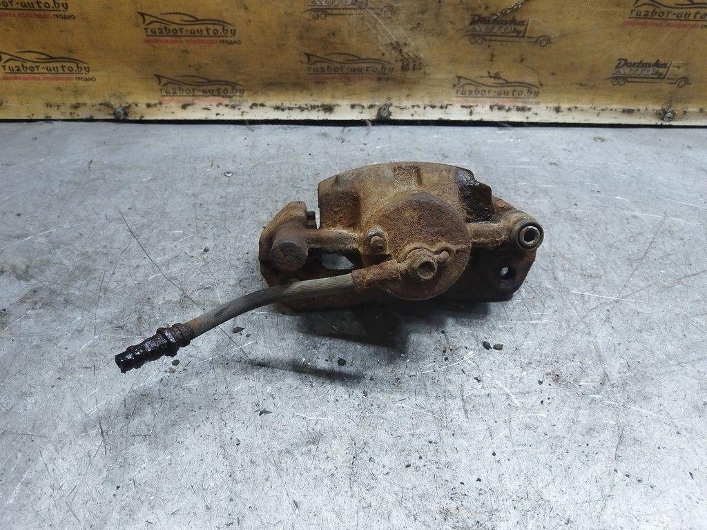 Суппорт передний левый P21G5W Mazda Xedos 6 - Фото 2