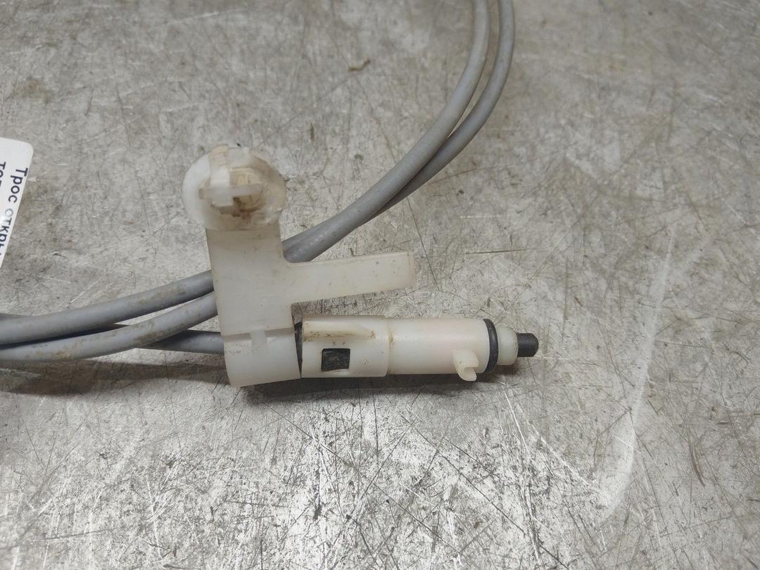 Трос открывания лючка топливного бака VA4QX0 Toyota Corolla купить на авторазборке