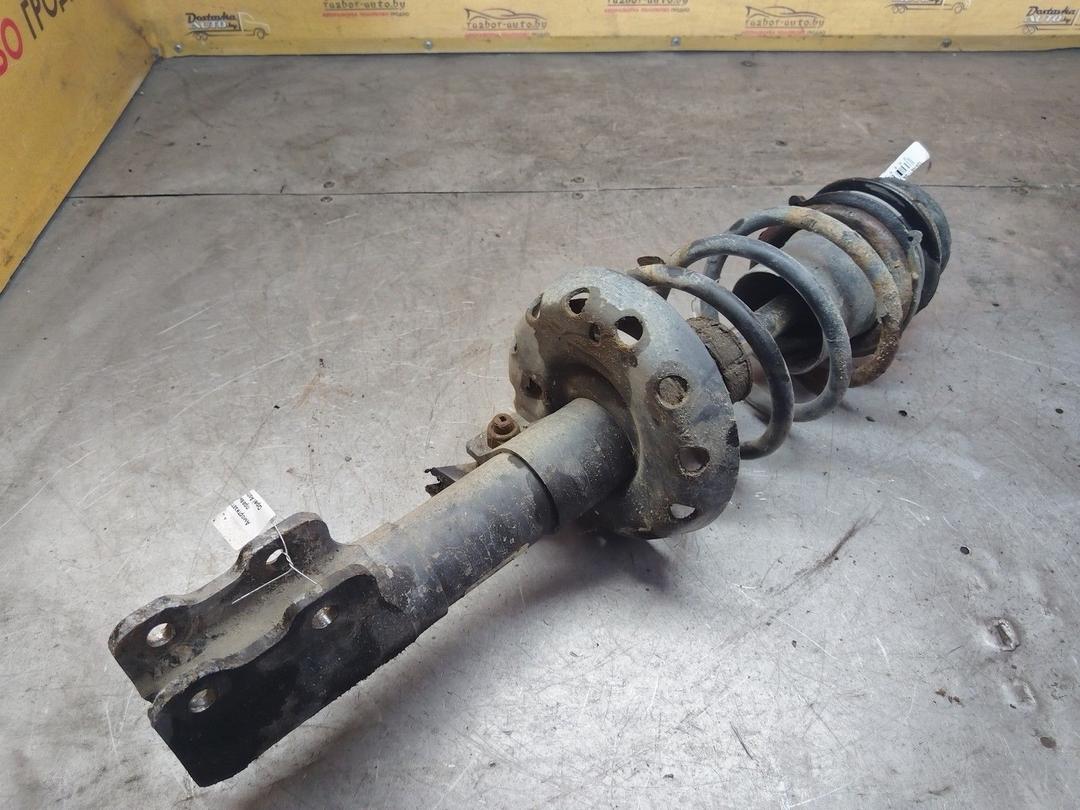 Амортизатор передний правый QI7XZ1 Opel Astra - Фото 1