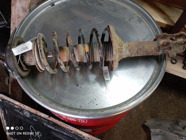 Амортизатор передний левый E8EJK0 Volkswagen Golf - Фото 1