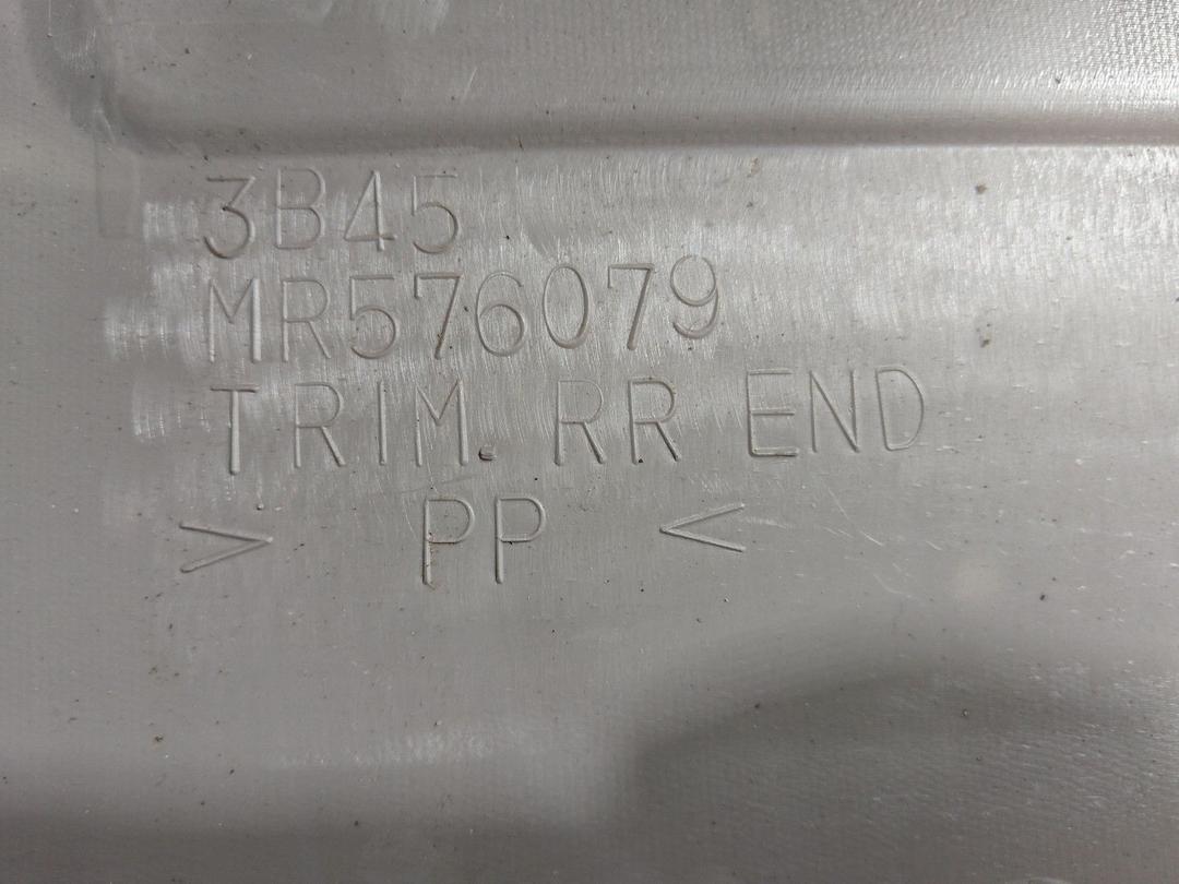 Накладка замка багажника 74P7K7 Mitsubishi Grandis купить в магазине запчастей бу