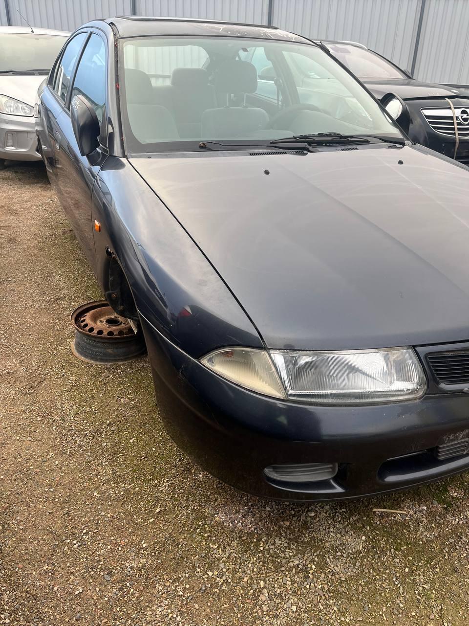 Бампер передний F1O869 Mitsubishi Carisma купить