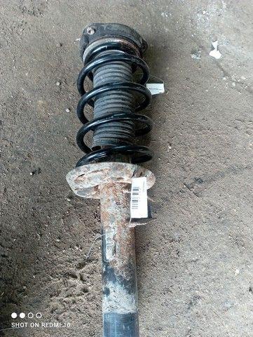 Амортизатор передний левый 7KF2H8 Volkswagen Passat