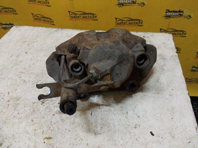 Суппорт передний левый 33P6RS Volkswagen Passat купить