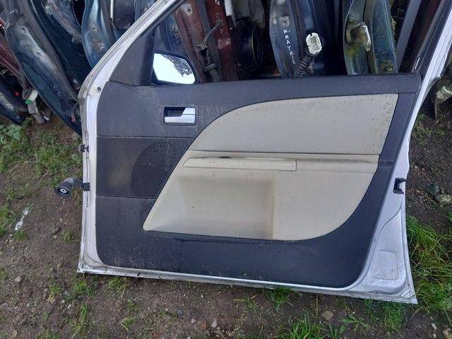 Обшивка двери передней правой (дверная карта) 0VOG8R Ford Mondeo купить