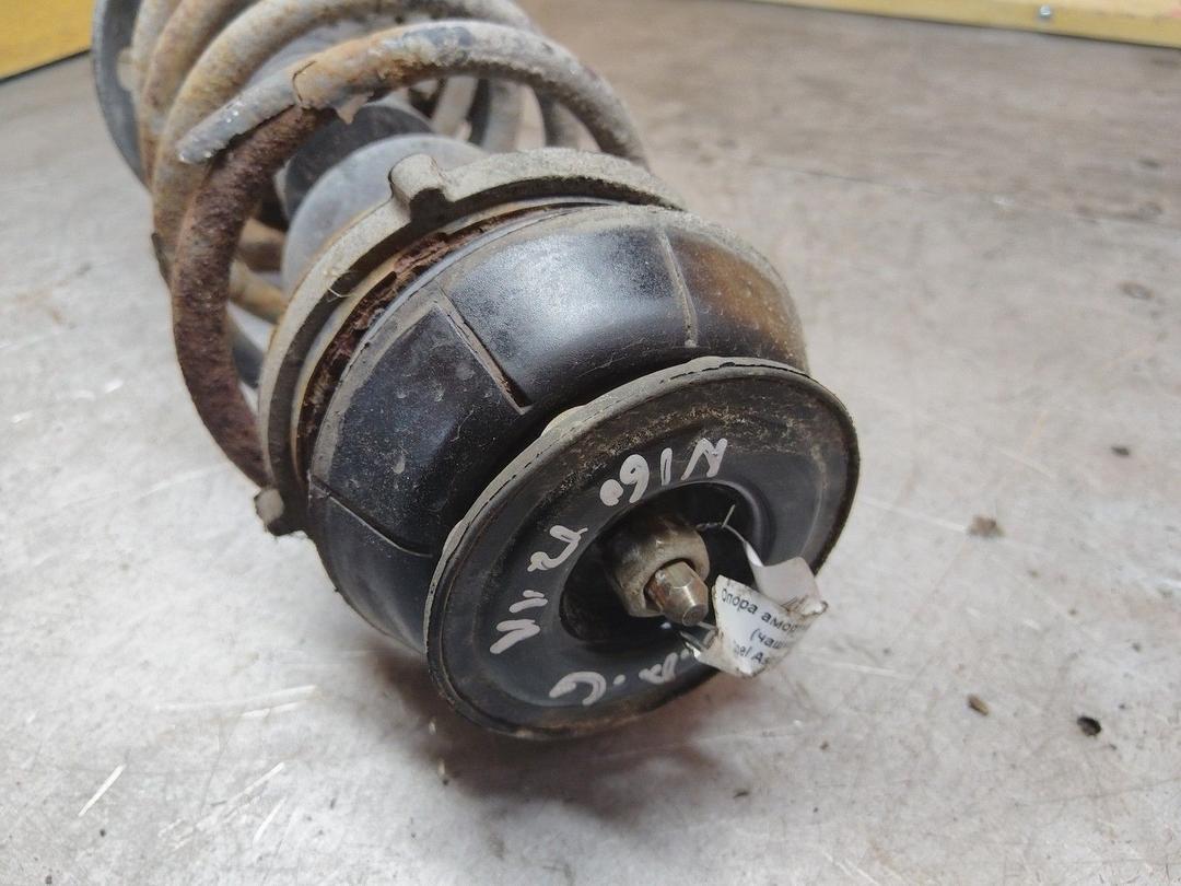 Амортизатор передний левый 0X9WZ7 Opel Astra купить в магазине запчастей бу