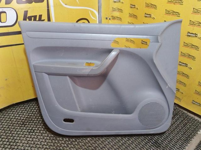 Обшивка двери передней левой (дверная карта) JV234R Volkswagen Caddy