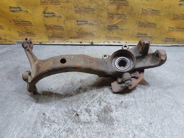 Кулак поворотный левый 771OG2 Volkswagen Passat купить в магазине запчастей бу