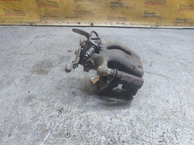 Суппорт задний правый T48DML Volkswagen Jetta