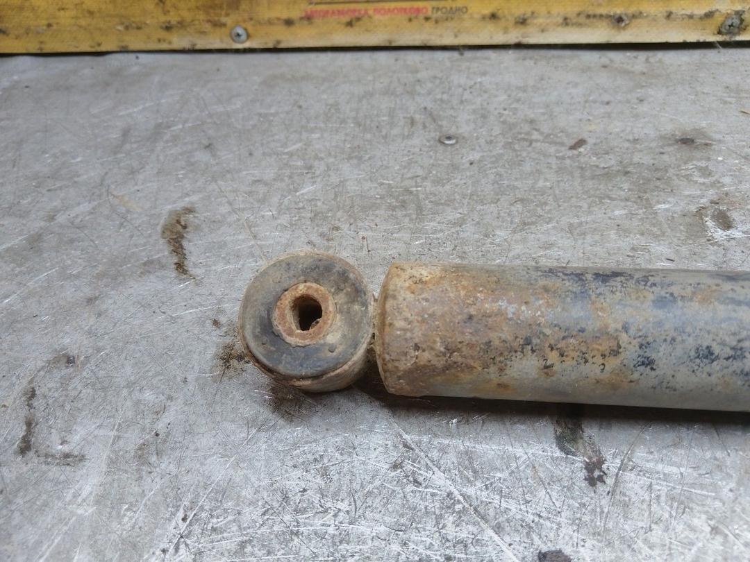 Амортизатор задний левый E4HIL2 Ford Escort купить в магазине запчастей бу