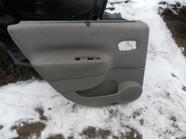 Обшивка двери задней левой (дверная карта) 6K292M Renault Scenic