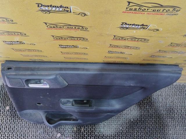 Обшивка двери задней правой (дверная карта) D75GJK Opel Astra купить