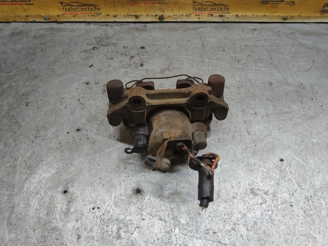 Суппорт передний левый V3BNN3 Audi 100 купить в магазине запчастей бу