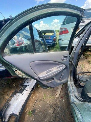 Обшивка двери задней левой (дверная карта) YW1JJT Nissan Almera