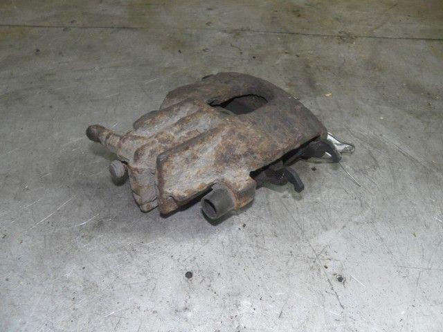 Суппорт передний левый Y89LDA Ford Focus купить