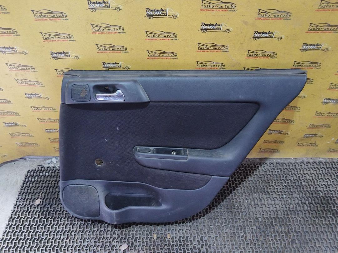 Обшивка двери задней правой (дверная карта) D75GJK Opel Astra