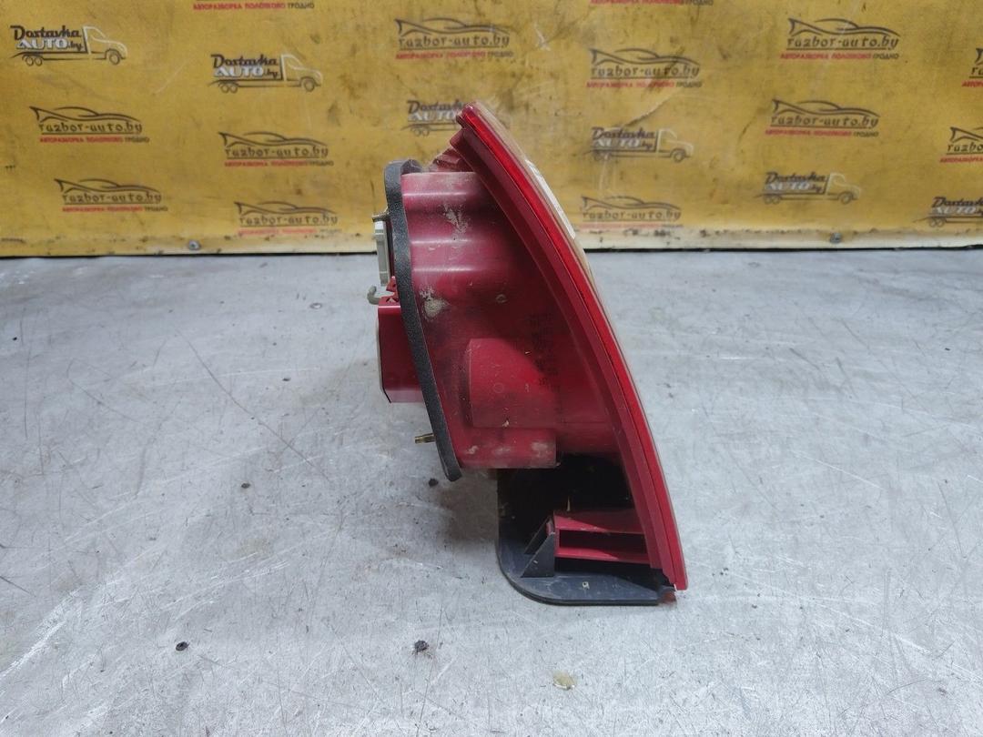 Фонарь задний левый 73SNE7 Volkswagen Passat купить