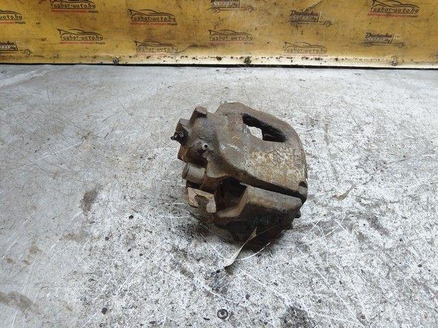 Суппорт передний правый SLNUUX Renault Laguna