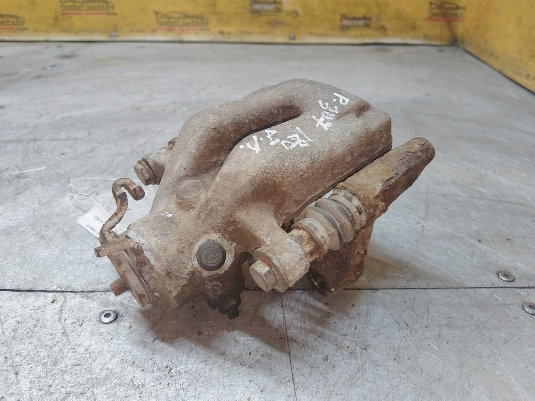 Суппорт задний левый 7Q1P13 Peugeot 307 купить с доставкой