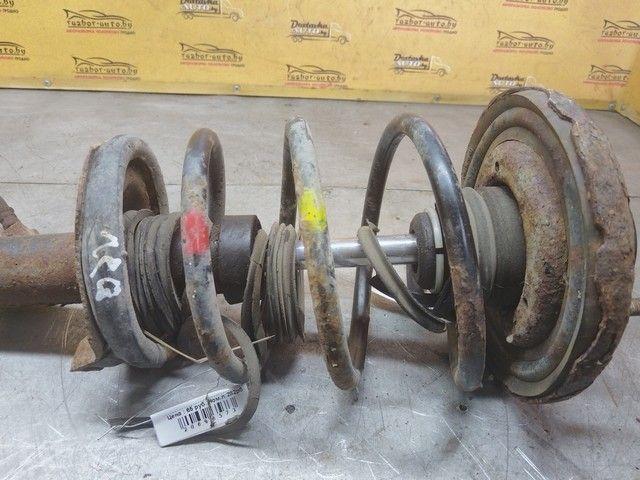 Амортизатор передний левый W9GCZG Nissan Primera - Фото 5