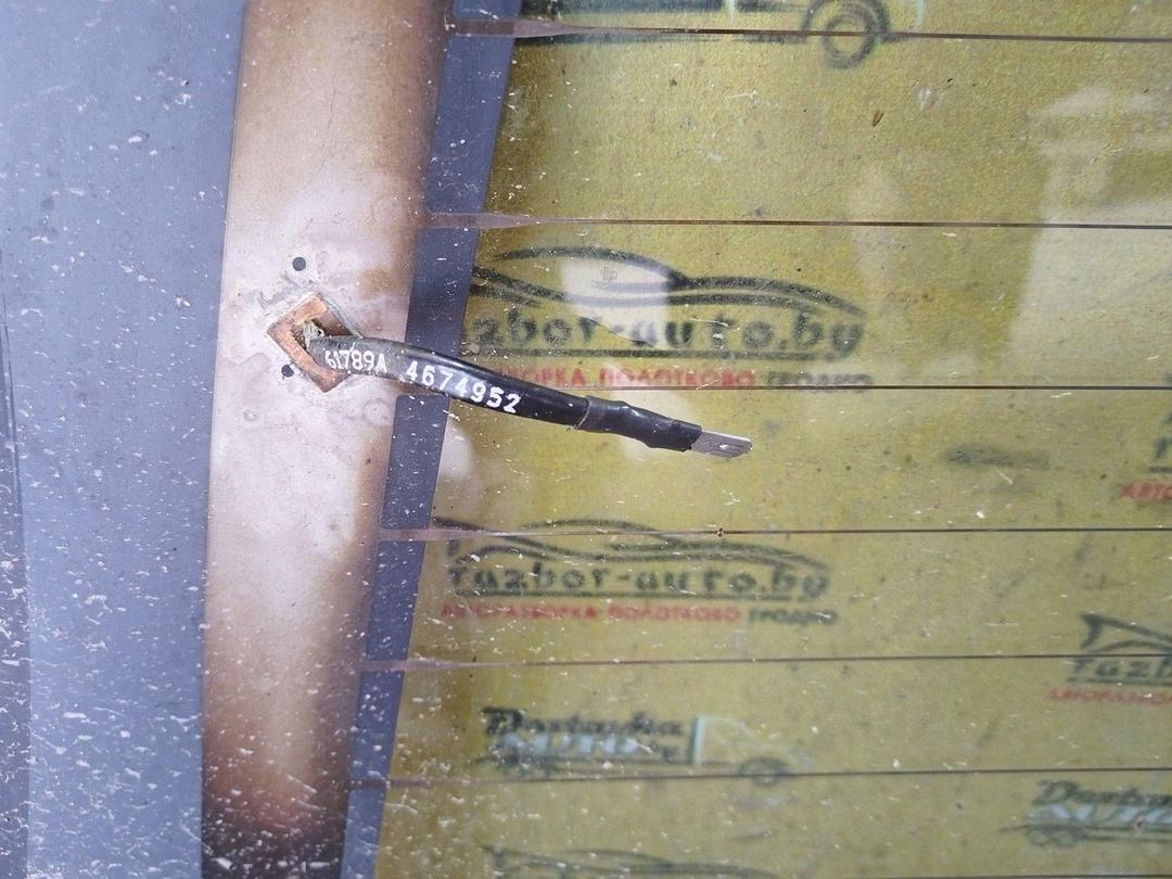 Стекло заднее UIDA28 Chrysler Voyager купить в магазине запчастей бу