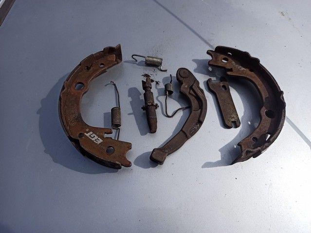 Механизм развода задних тормозных колодок левый H6H67D Toyota Corolla Verso