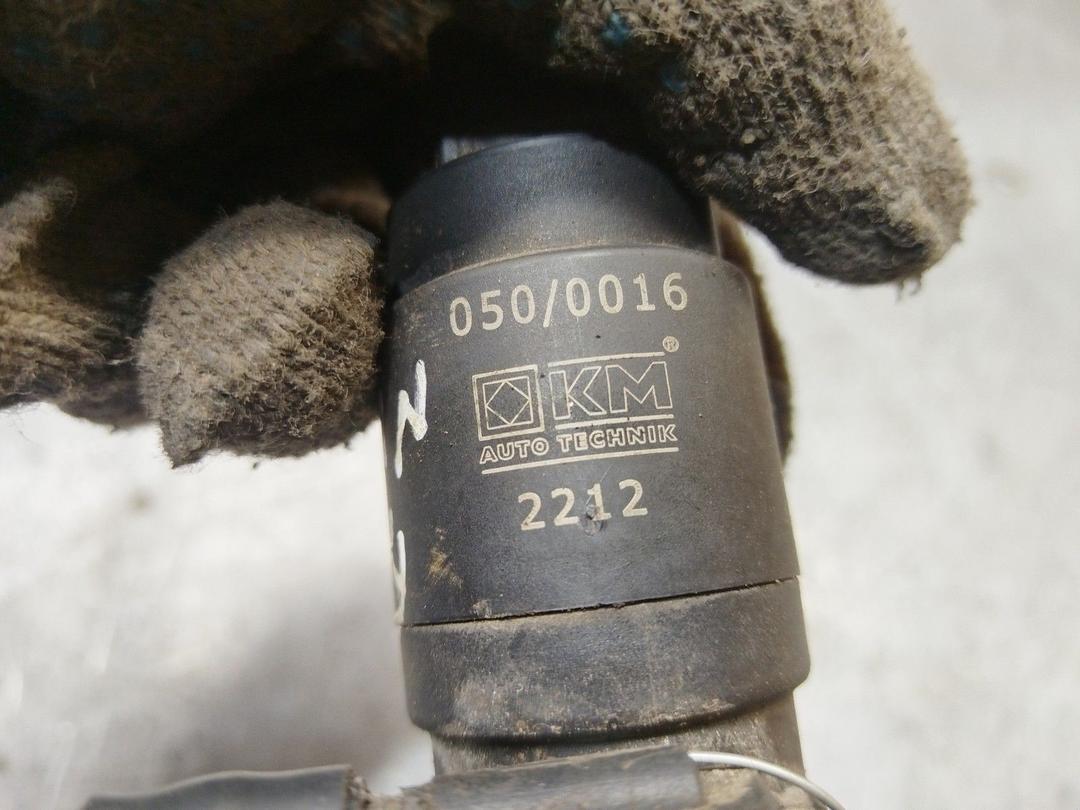 Насос (моторчик) омывателя стекла 7VD86X Opel Astra купить в магазине запчастей бу