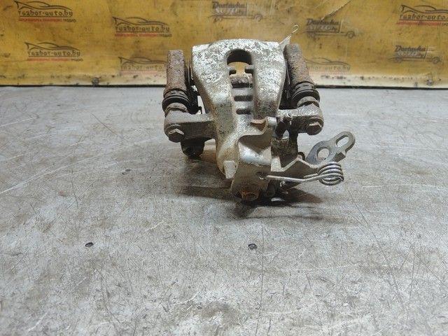 Суппорт задний левый BXEJK1 Ford Galaxy купить с доставкой