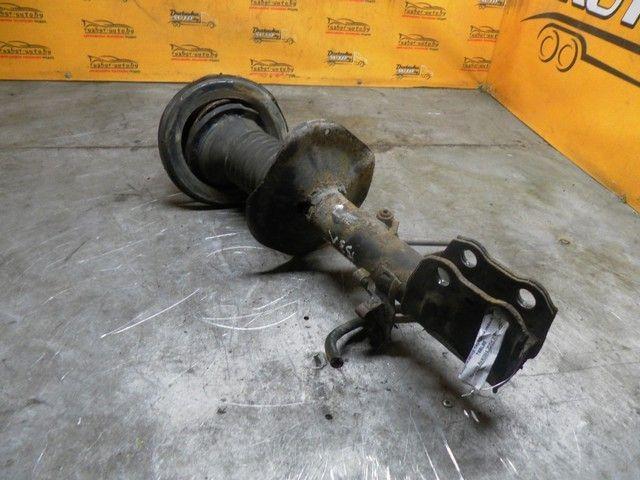 Амортизатор передний левый T6BL88 Toyota Avensis