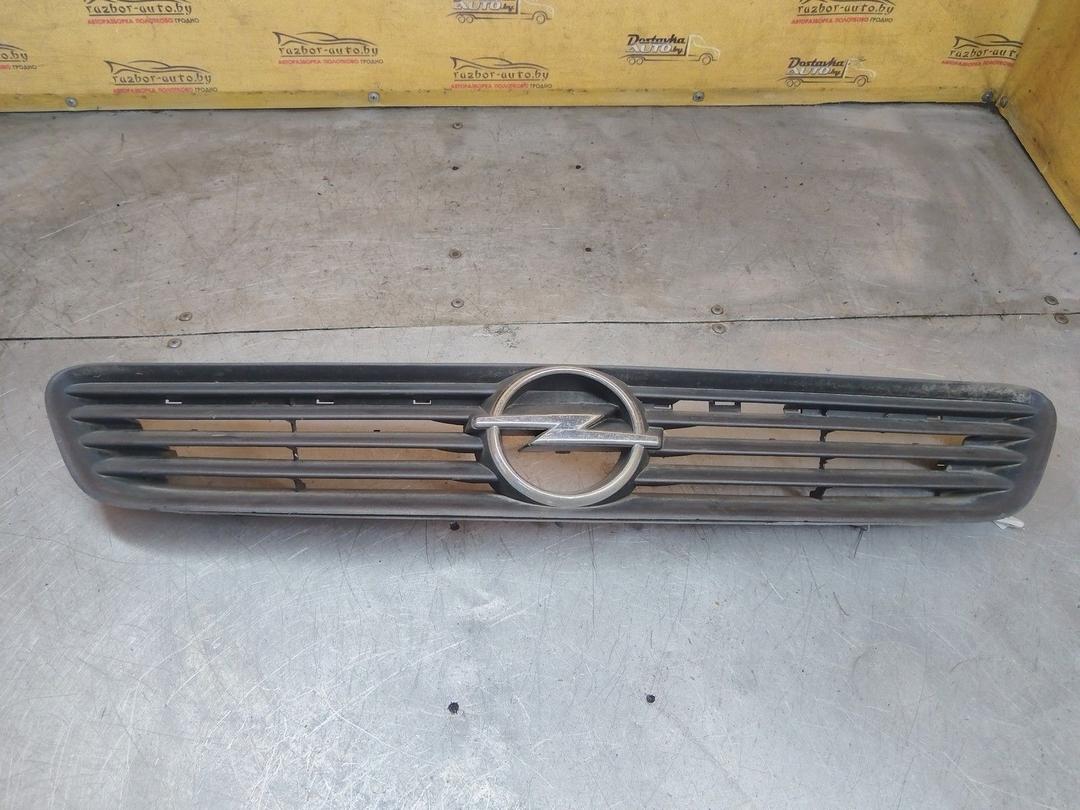 Решетка капота V1ZJSR Opel Astra - Фото 1